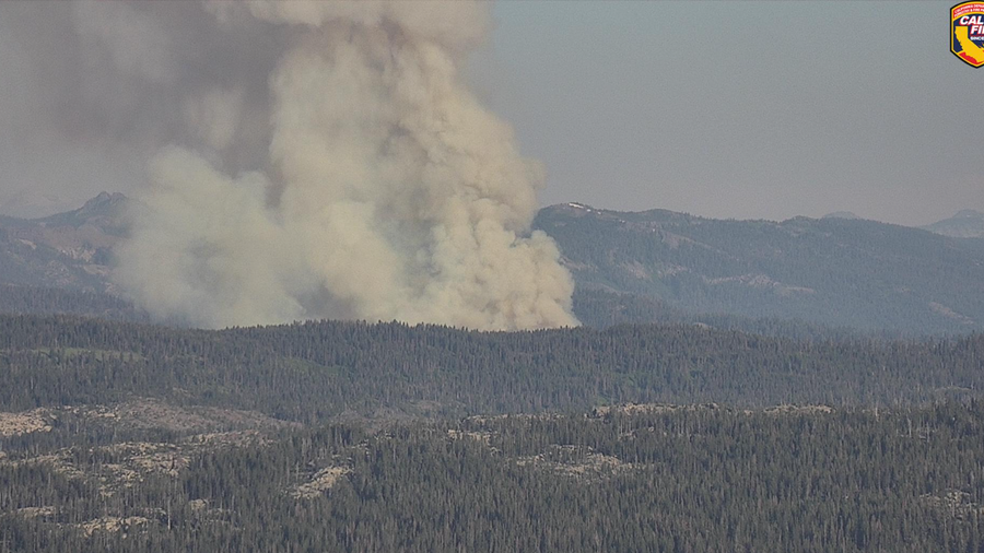 Royal Fire Crews battle flames at Tahoe National Forest, smoke visible