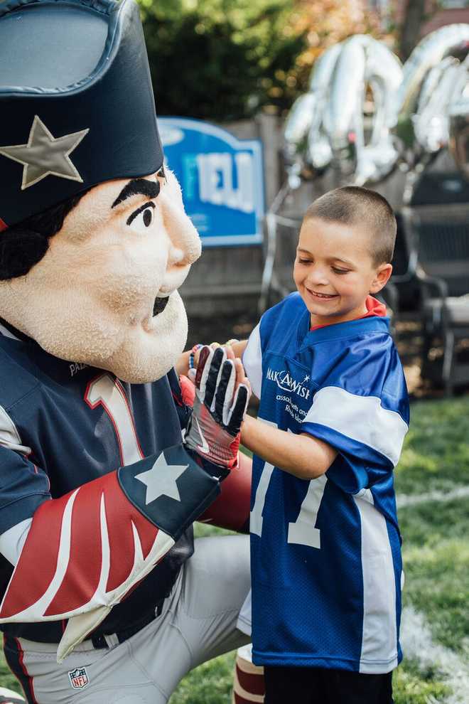 Gronk visits backyard football field of 'Make a Wish' child 