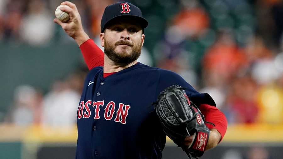 Boston Red Sox relief pitcher Ryan Brasier throws against the Houston Astros during the ninth inning in Game 2 of baseball's American League Championship Series Saturday, Oct. 16, 2021, in Houston. (AP Photo)