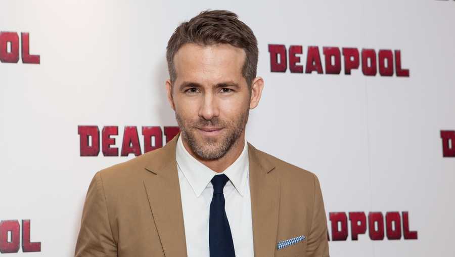 In a Oct. 28, 2016 file photo, actor Ryan Reynolds poses for photographers upon arrival at a fan screening of the film ‘Deadpool’, in central London.