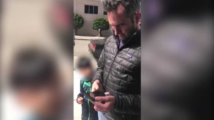 A young boy came to the defense of a black man on the Fourth of July as the boy's father questioned and later called the police on the man who said he was waiting for a friend at a San Francisco apartment building.