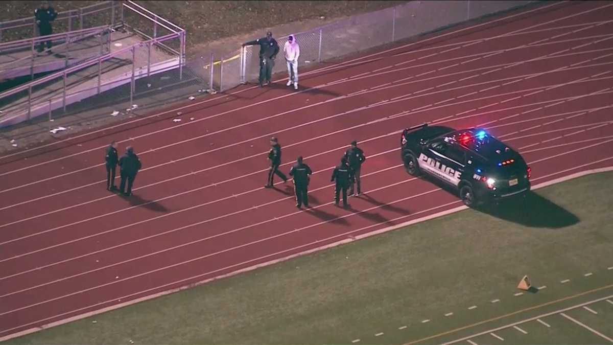 Man, child shot at New Jersey high school football game