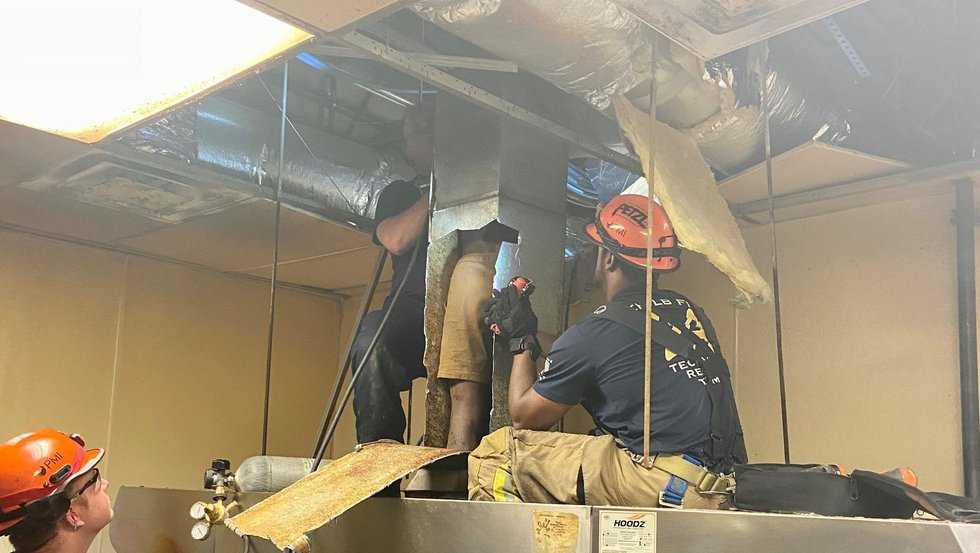 Video Possible burglar rescued from pizza oven vent