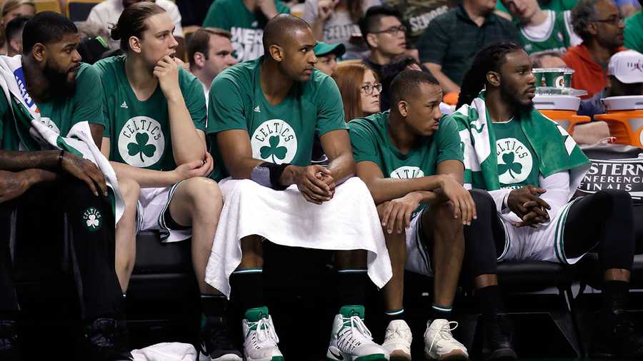  Boston Celtics players, from left, Amir Johnson, Kelly Olynyk, Al Horford, Avery Bradley and Jae Crowder watch from the bench during the second half of Game 2 of the NBA basketball Eastern Conference finals against the Cleveland Cavaliers, Friday, May 19, 2017, in Boston.