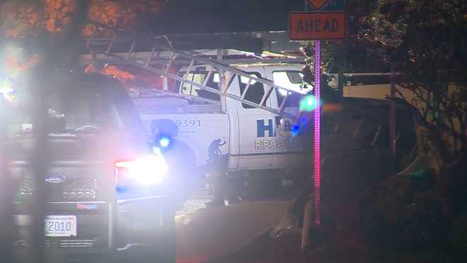 A&#x20;Home&#x20;Resolutions&#x20;pickup&#x20;truck&#x20;that&#x20;was&#x20;struck&#x20;by&#x20;a&#x20;white&#x20;van,&#x20;which&#x20;was&#x20;being&#x20;pursued&#x20;by&#x20;police,&#x20;on&#x20;Elm&#x20;Street&#x20;in&#x20;Salisbury,&#x20;Massachusetts&#x20;on&#x20;Nov.&#x20;1,&#x20;2021.