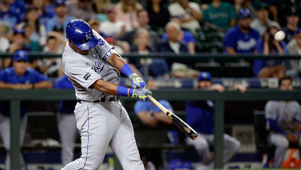 Seattle Mariners' Robinson Cano swings at a pitch in front of