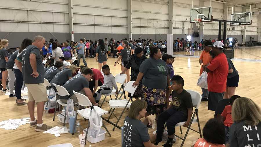 Hundreds stood in line for free shoes and socks