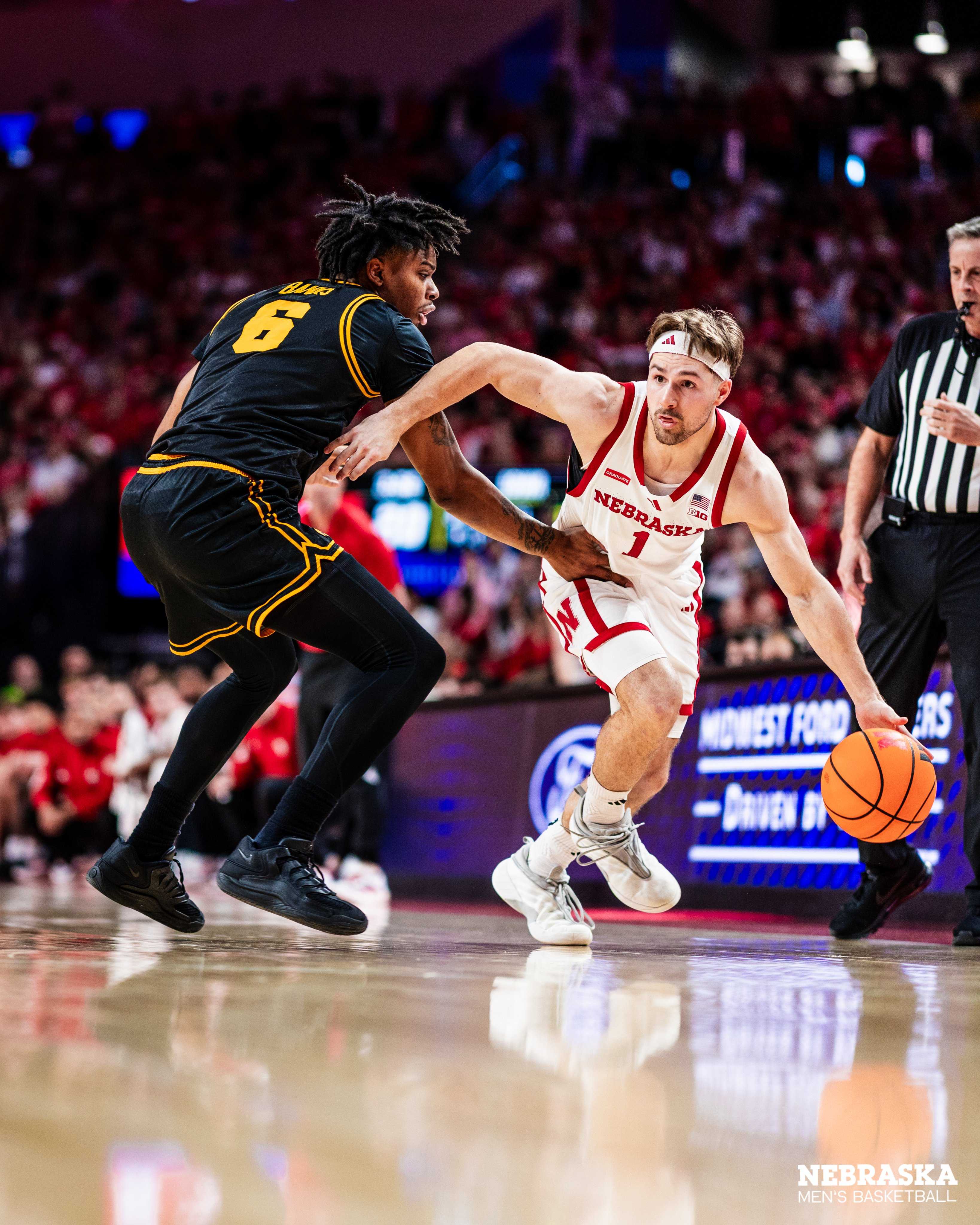 'Victory formation': Husker men's basketball defeats Iowa in overtime on senior night