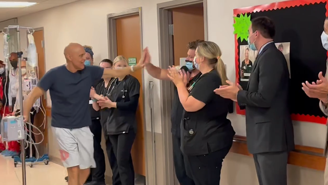 Watch: Man walks marathon in hospital after beating cancer for third time - Vimarsana News