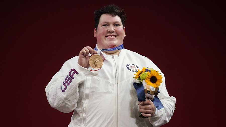 Sarah Elizabeth Robles of the United States poses with her bronze medal in the women's +87kg weightlifting at the 2020 Summer Olympics, Monday, Aug. 2, 2021, in Tokyo, Japan. (AP Photo/Seth Wenig)