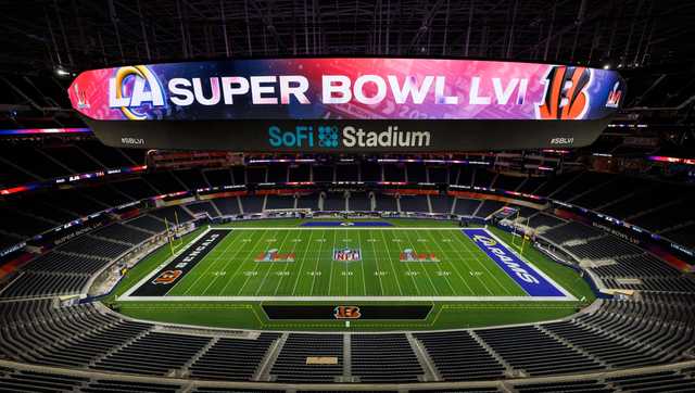 Inglewood, USA. 01st Feb, 2022. Workers paint the Super Bowl LVI logo on  the field at SoFi Stadium. The Los Angeles Rams and the Cincinnati Bengals  will meet here on February 13