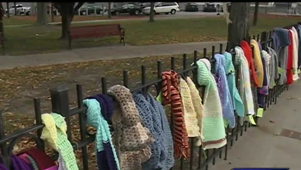 Hundreds of scarves, mittens distributed in Manchester park