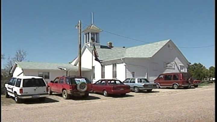 Students and teachers fight to keep school with only three classrooms open in 1999