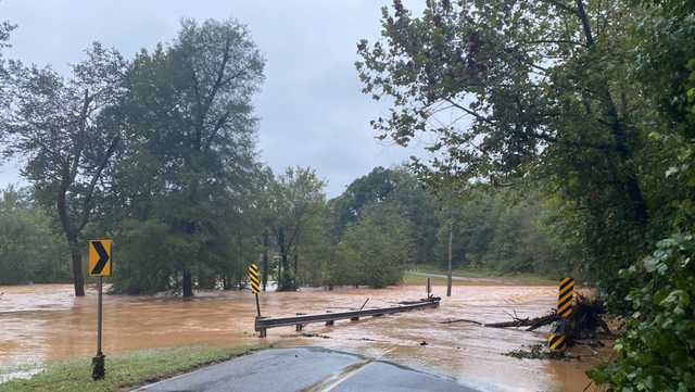 ANDERSON: Man hangs from tree after road washes out - Vimarsana News