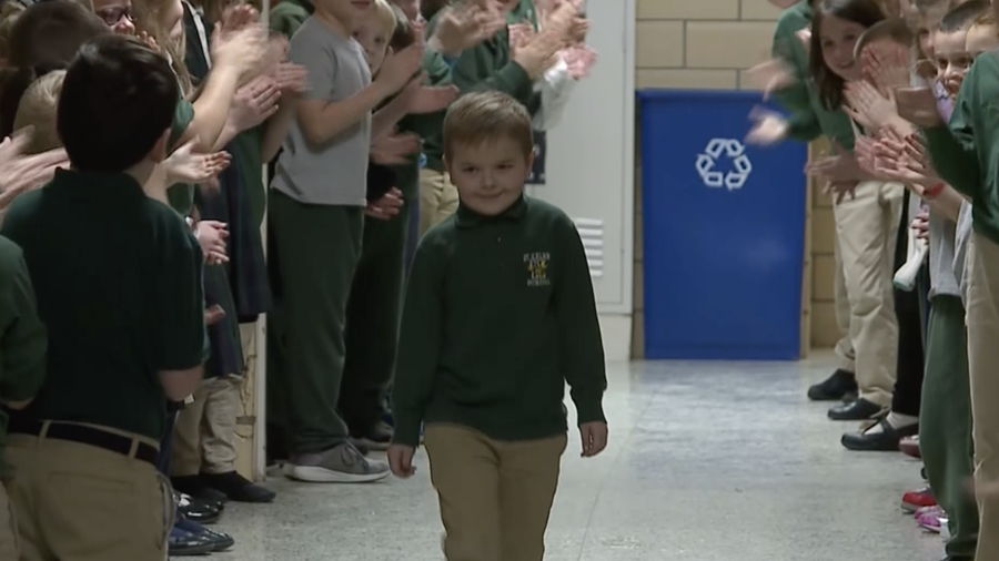 School celebrates six-year-old who beat leukemia