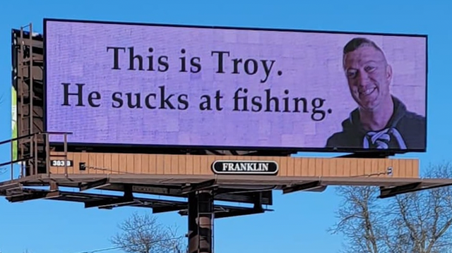 Man buys billboard ad space to 'smack talk' his fishing buddy - Vimarsana News
