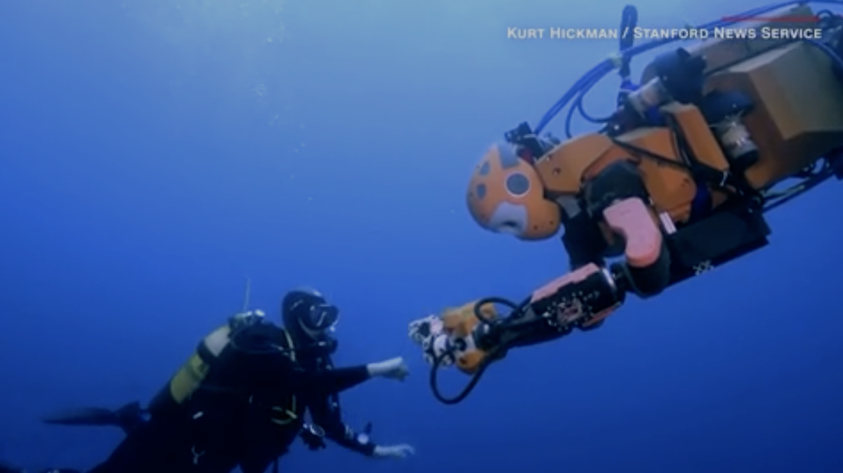 Scuba Diving Robot Feels For Sunken Treasure On Ocean Floor Scuba Diving Robot Feels For Sunken Treasure On Ocean Floor