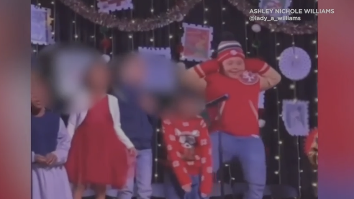 The boy steals the show with his dance moves at a school party