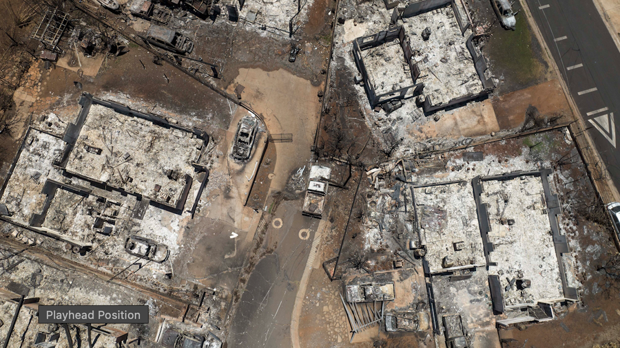 Charred cars and buildings are visible in the aftermath of a wildfire in Lahaina, Hawaii, Aug. 22, 2023.