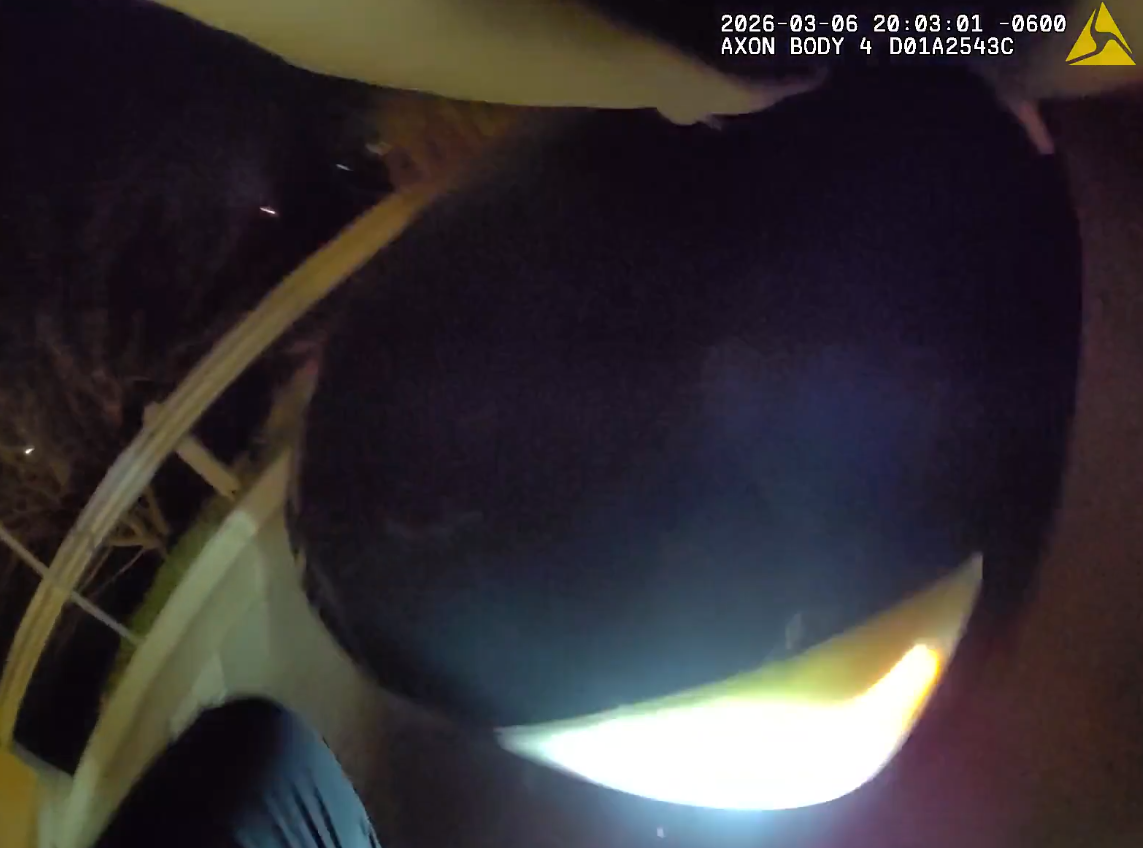 ‘Drive! Drive! Drive!’: Video shows officer riding on hood of stranger’s car during chase