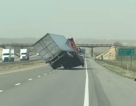 WATCH: Video captures semi tipping over on Oklahoma interstate due to high winds