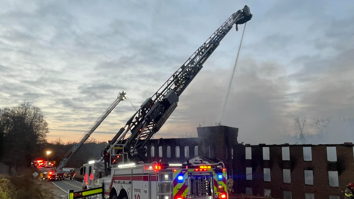 NC PHOTOS Graham Fire Deparment on the scene of Carolina Mill Road fire
