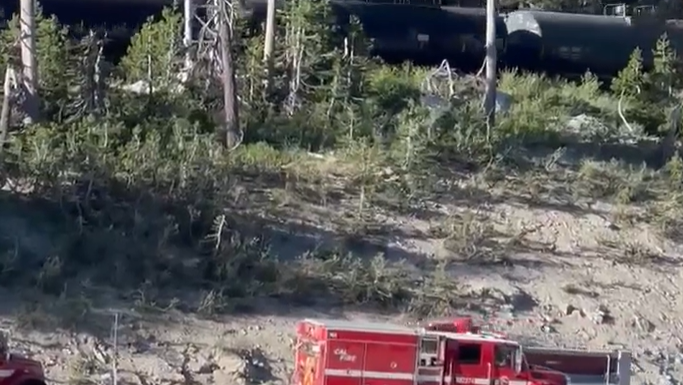 Big rig overturns, catches fire in Nevada County