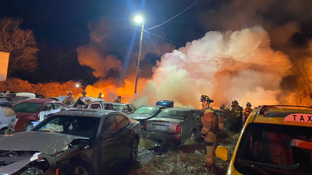 What are the long-term effects of junkyard fires?
