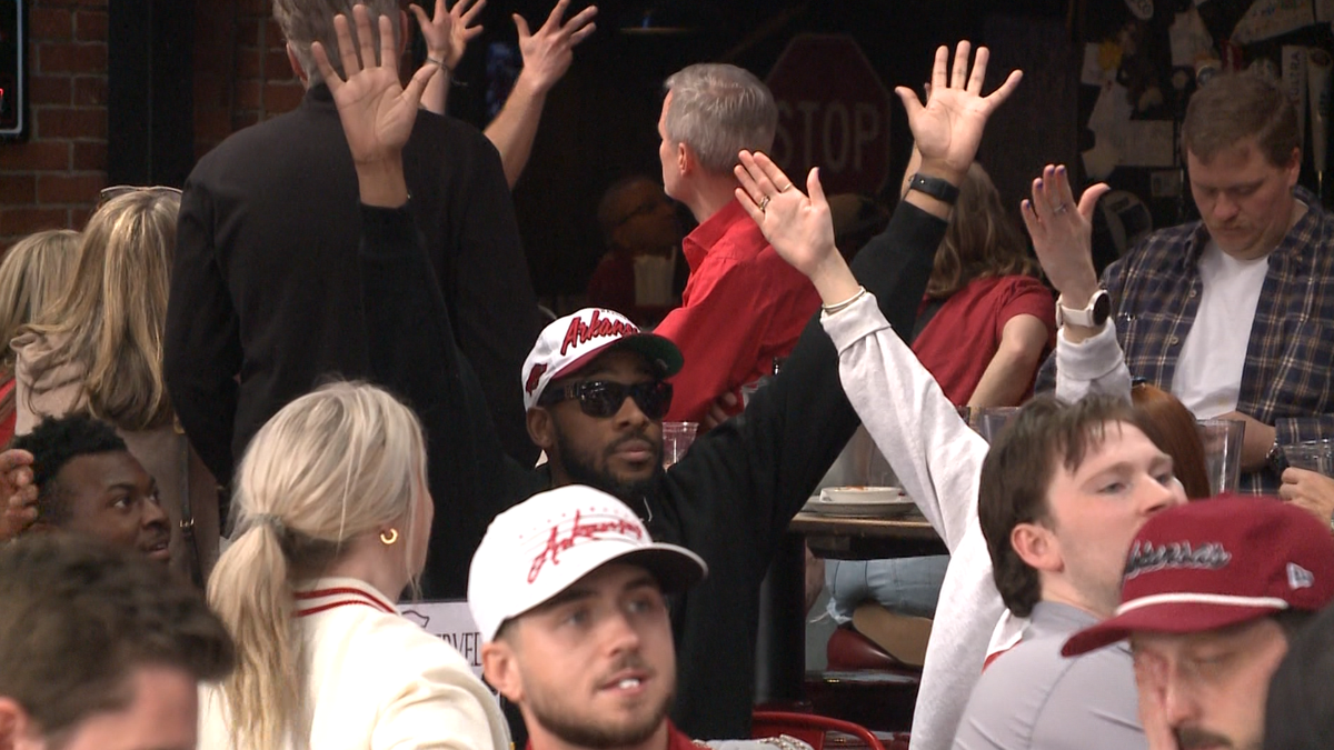 Happy Razorback Fans Razorback fans celebrate as Hogs reach Sweet 16