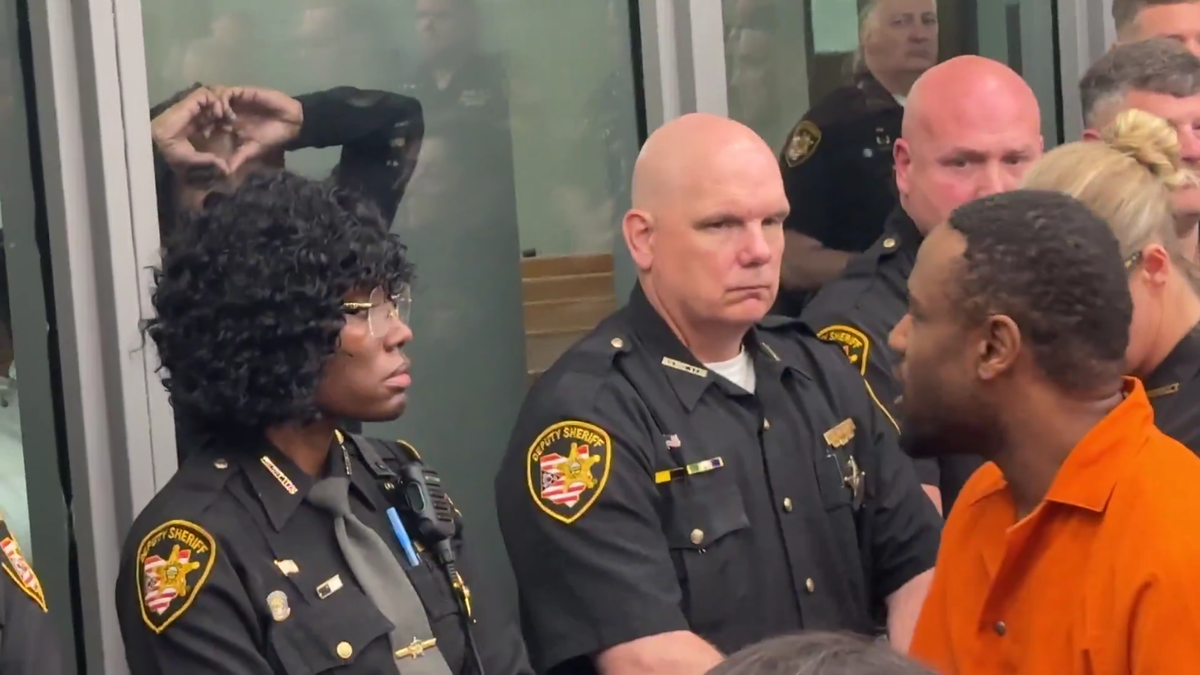 PHOTOS: Officers pack courtroom at arraignment of man accused of ...