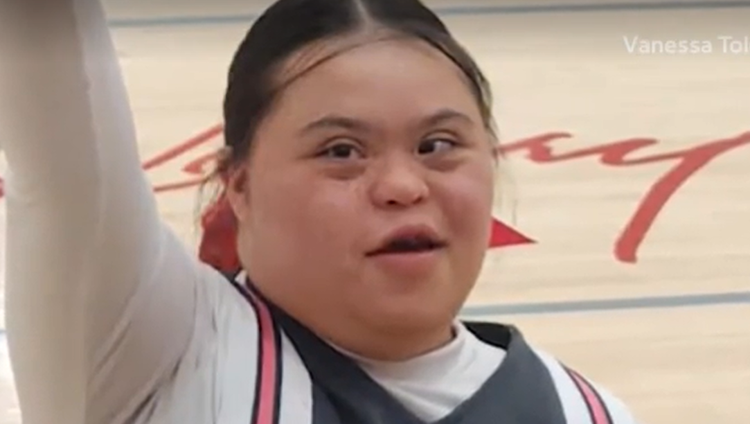 Longtime cheerleader with Down syndrome aiming for college team
