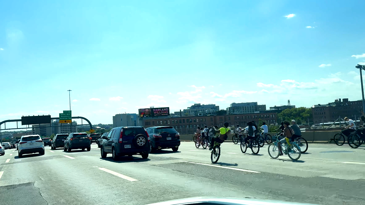 Man charged after 100 bikes seen riding on Boston highways, tunnels