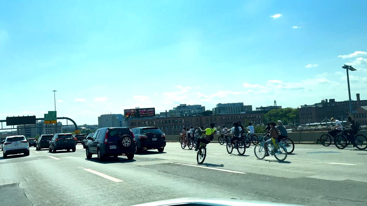 Man charged after 100 bikes seen riding on Boston highways, tunnels