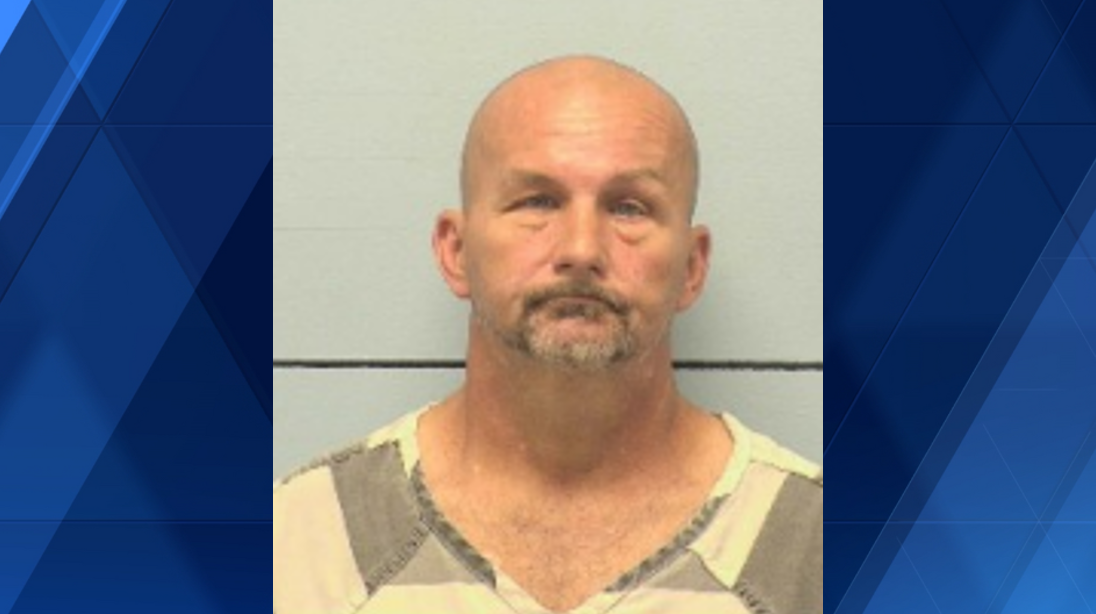 North Carolina man charged with double murder after men found dead in house fire