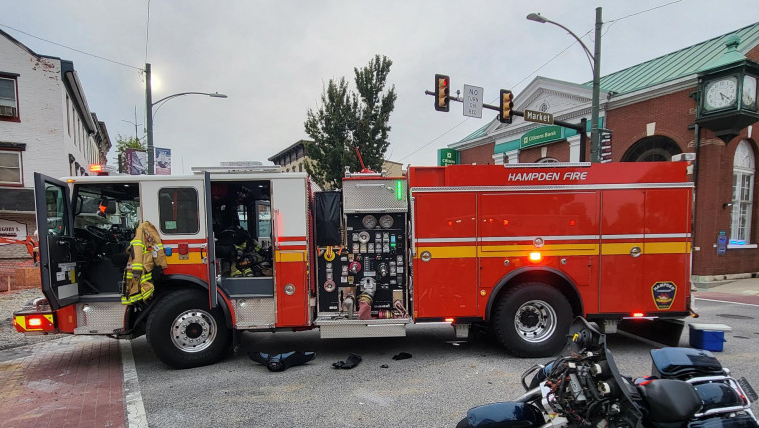 Person injured after motorcycle crashes into fire truck responding to ...
