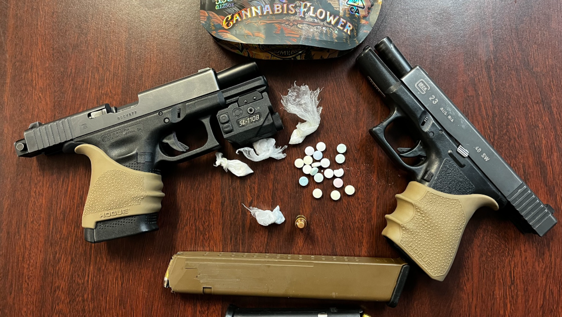 Two North Carolina men found with loaded guns, drugs in parking lot of high school football game, sheriff says