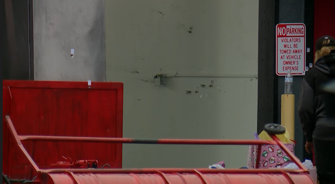 bullet holes in building where stockton shooting occurred