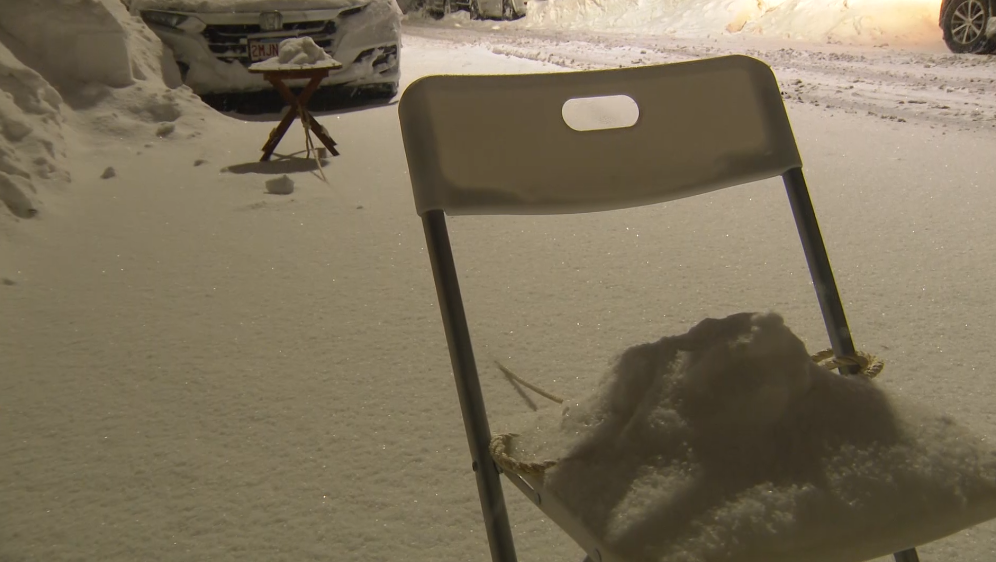 Drivers rush to use space savers as parking ban lifted in Boston