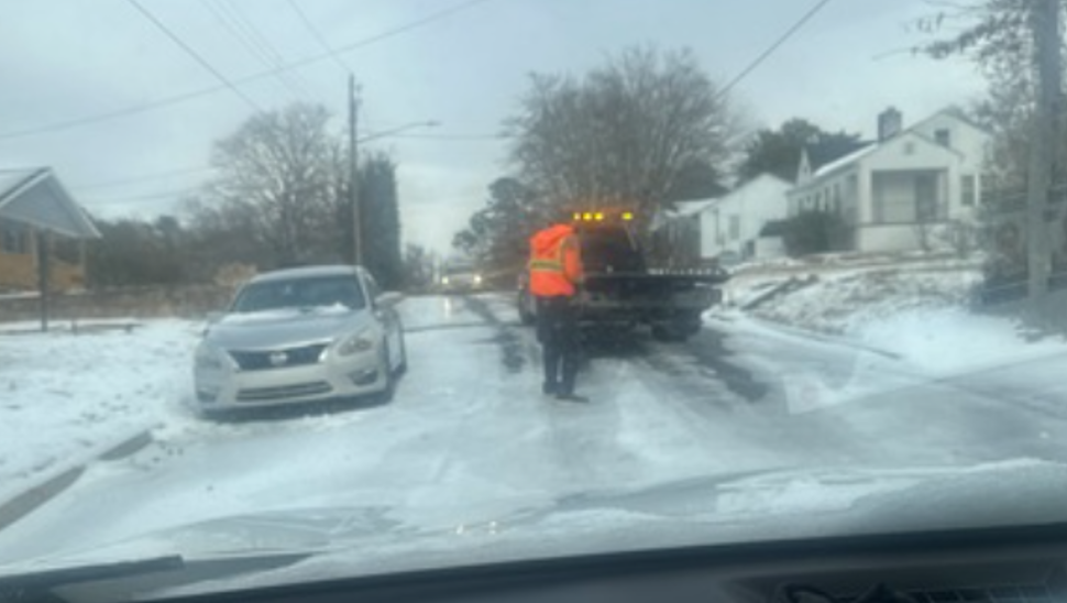 Why are some roads still bad with icy conditions in Winston-Salem?