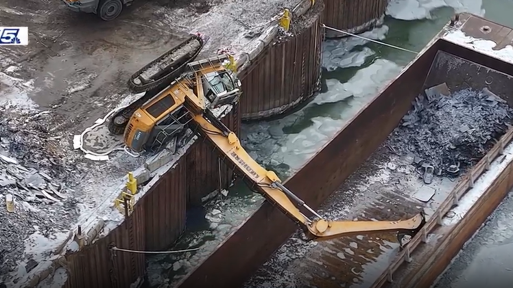 Worker rescued, hospitalized after falling from construction crane into river