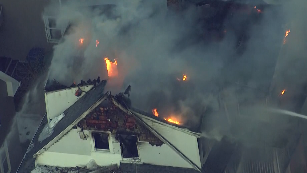 14 people displaced after 2-alarm fire burns through Mass. home - WCVB
