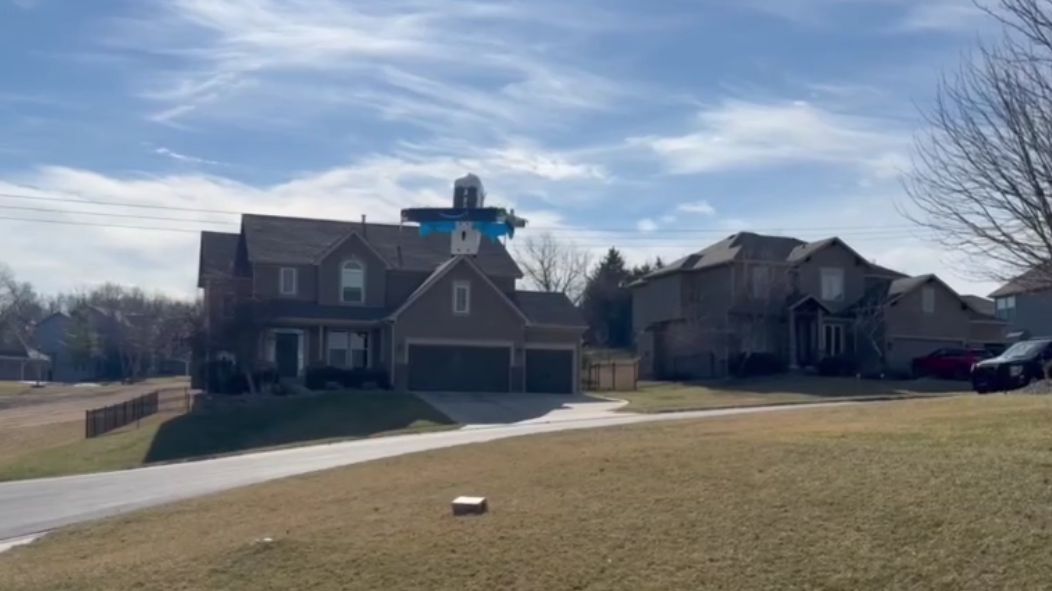 Watch: Amazon drone drops off package to front yard of Shawnee, Kansas, home