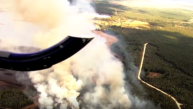 PHOTOS: Firefighters work to contain brush fire in Marion County