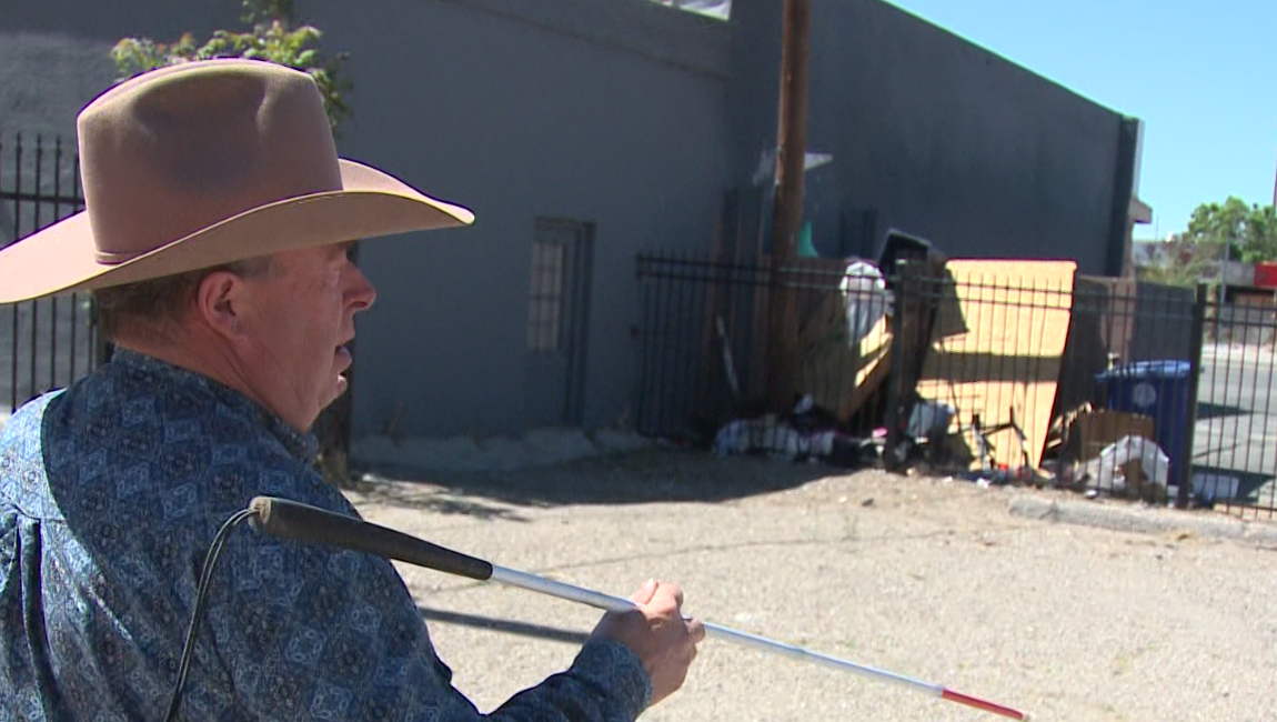 Business owner gets cited after removing needles and trash