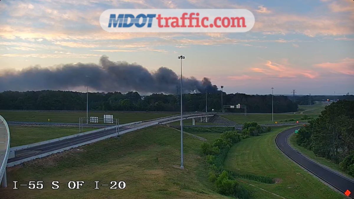 Firefighters work to contain massive fire burning for over 12 hours