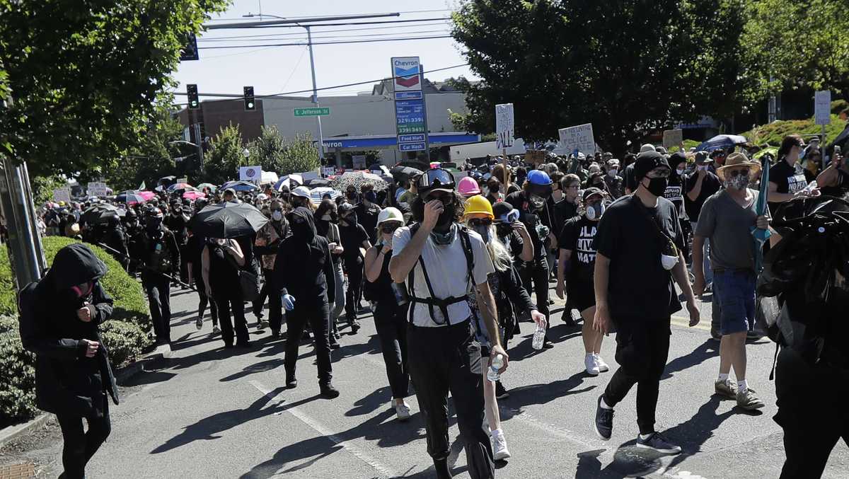 Police declare riot at Seattle protests, make arrests