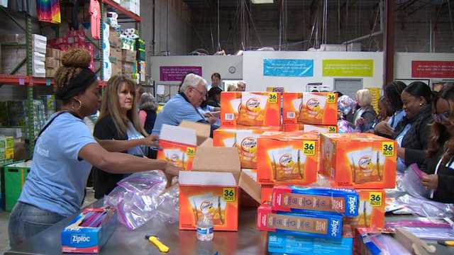 SECU employees help pack snack bags for students - Vimarsana News