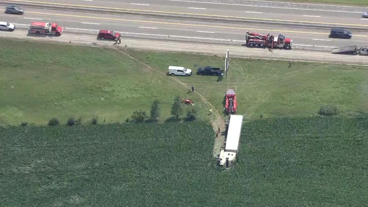 Semi-truck ends up in field after striking barrier truck on I-70 – KMBC Kansas City
