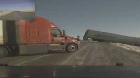 Shocking video shows semi truck spinning out into another on Wyoming