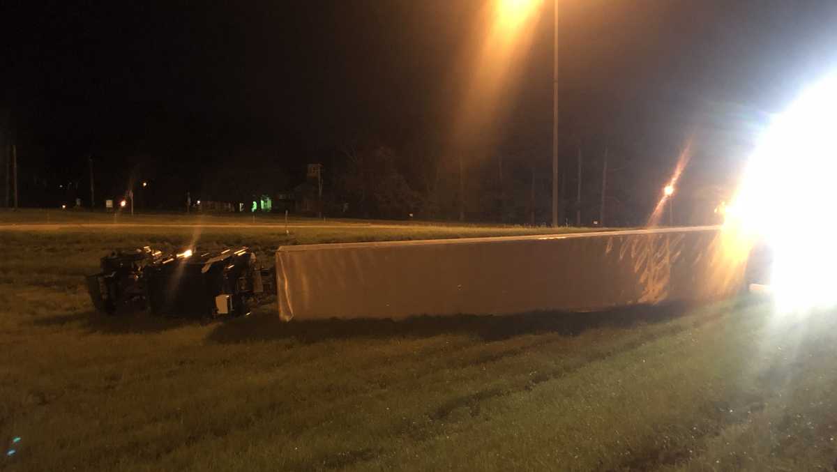 Driver injured after semi overturns on interstate